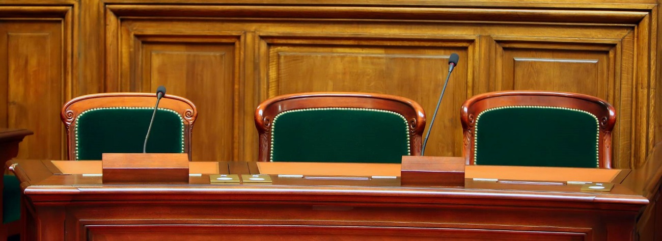 court room with wooden chairs